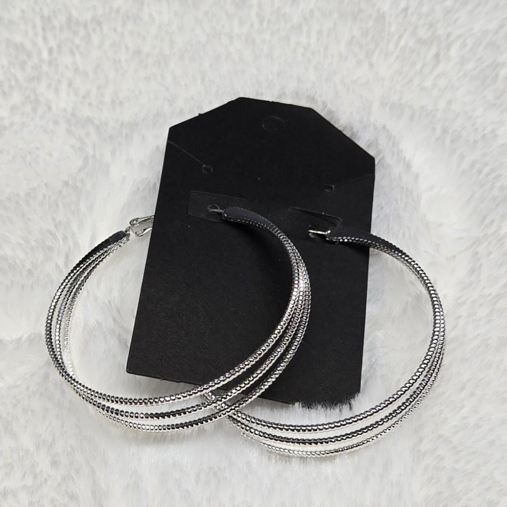 Bold Silver Earrings with Layered Hoop Design